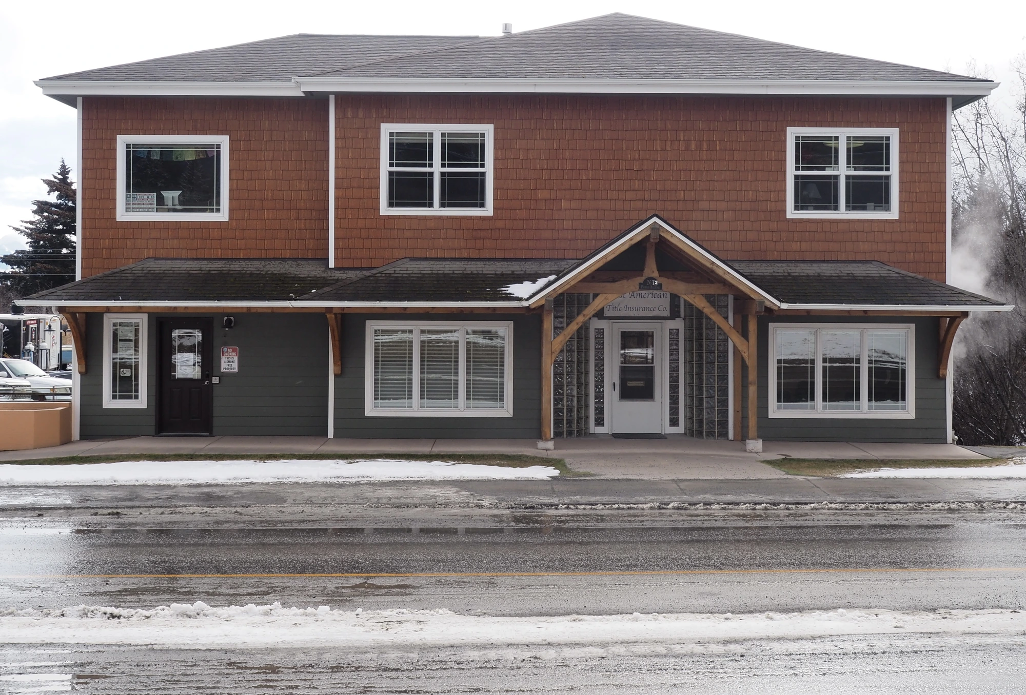 The Homer office for ILC, a brown-and-gray building with a gray shingle roof